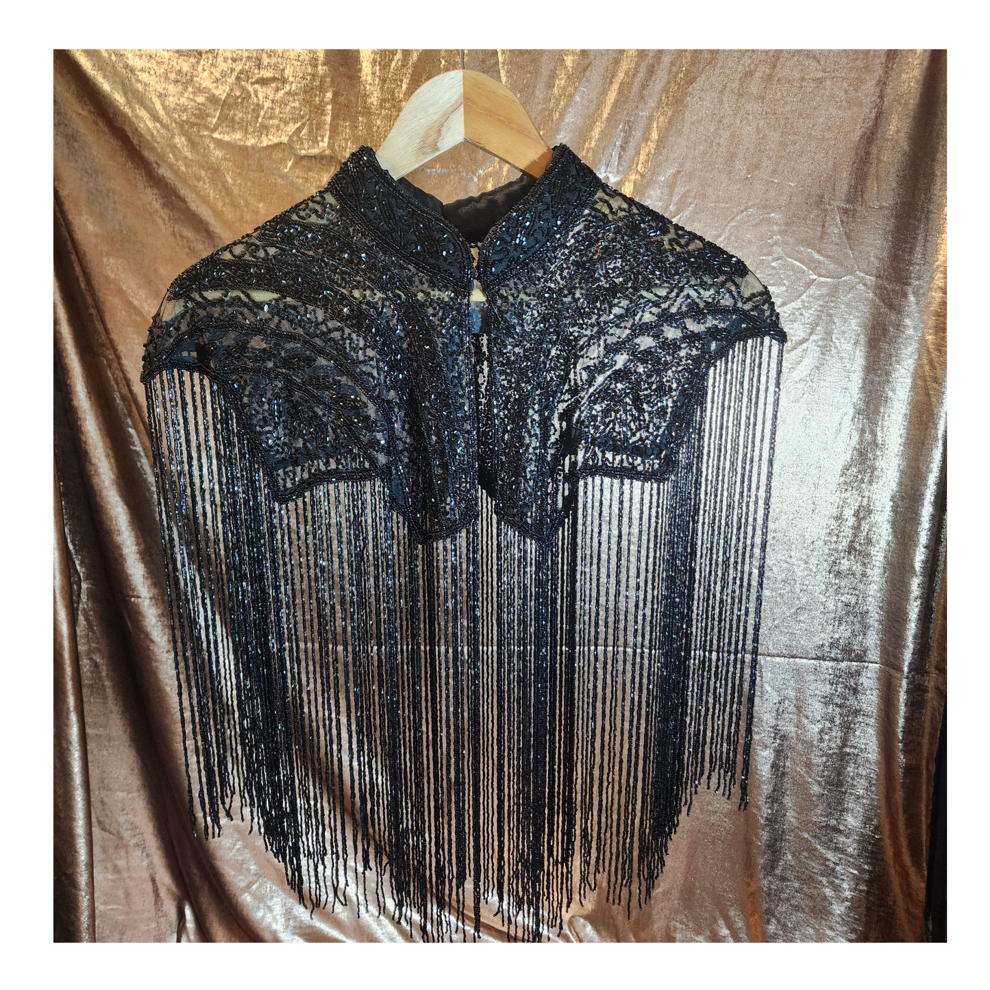 Hand-beaded on breathable mesh with soft tassels — designed to elevate any outfit.