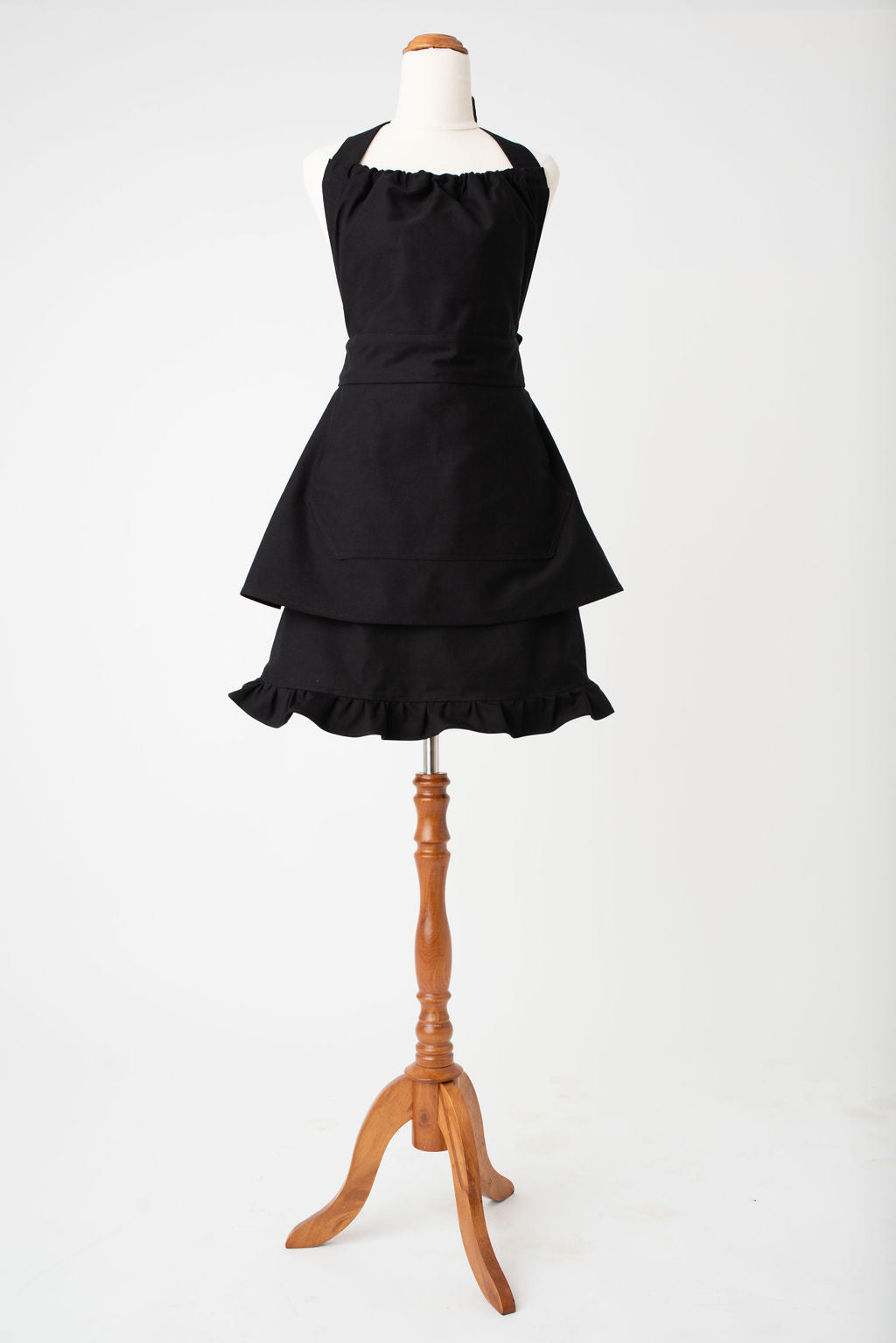 High waist feminine hostess apron in black by Pretty Made - Front