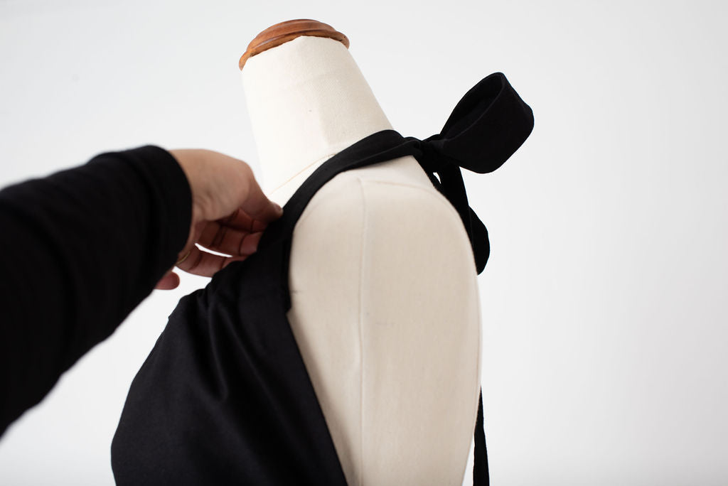 High waist feminine hostess apron in black by Pretty Made - detail 