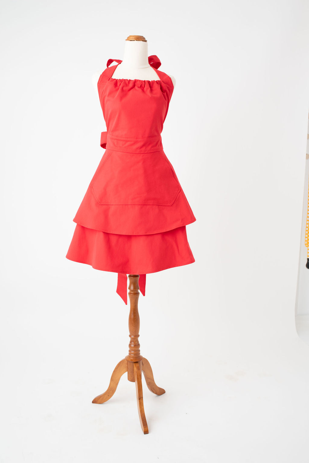 High waist feminine hostess apron in red by Pretty Made - front 
